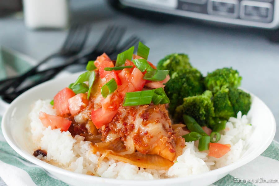 plate with rice and monterey chicken on top