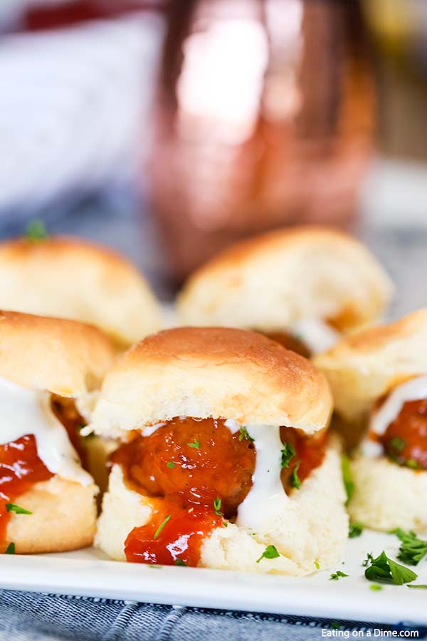 Crock Pot Buffalo Chicken Meatballs Sliders recipe gives you lots of buffalo flavor in bite size sliders. Try easy buffalo chicken meatballs for game day.