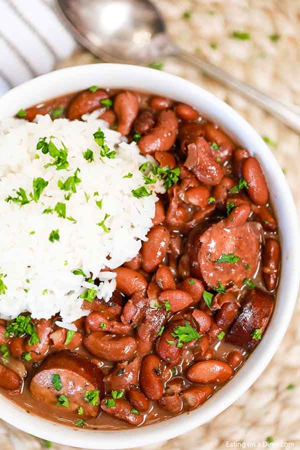 Crock Pot Red Beans and Rice Recipe is a one pot meal full of flavor and budget friendly. This meal is so delicious with the sausage, beans and rice.