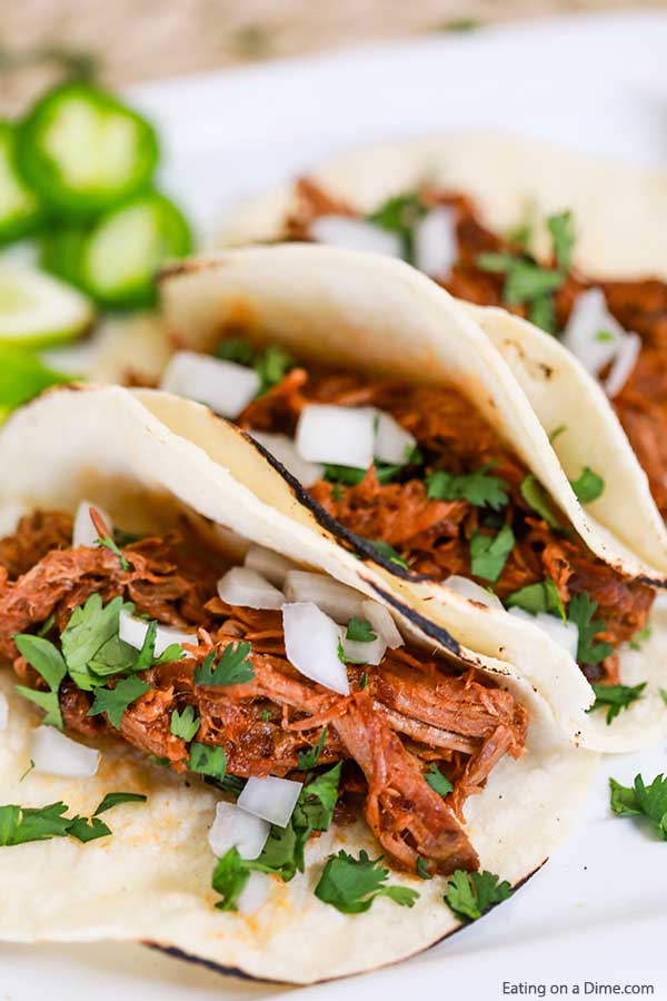 This delicious Crock Pot Chipotle BBQ Steak Tacos Recipe is so simple but takes street tacos to the next level. Try these flavorful shredded beef tacos!