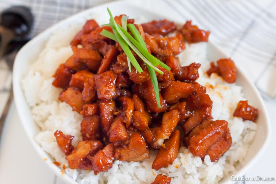 Bourbon Chicken over rice on a plate