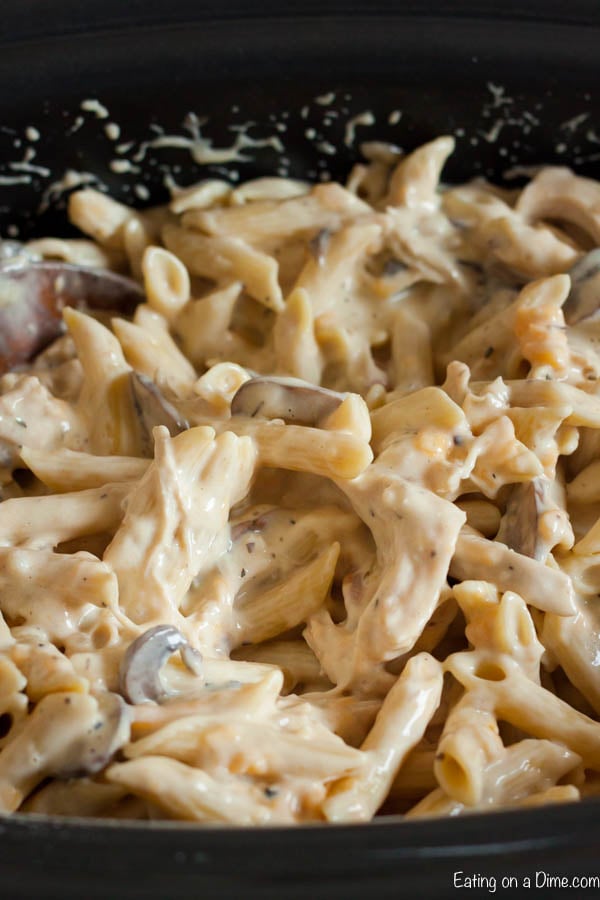 Crock pot cheesy chicken penne recipe is the best comfort food and loaded with tons of creamy chicken and cheesy pasta.  The slow cooker does all the work!