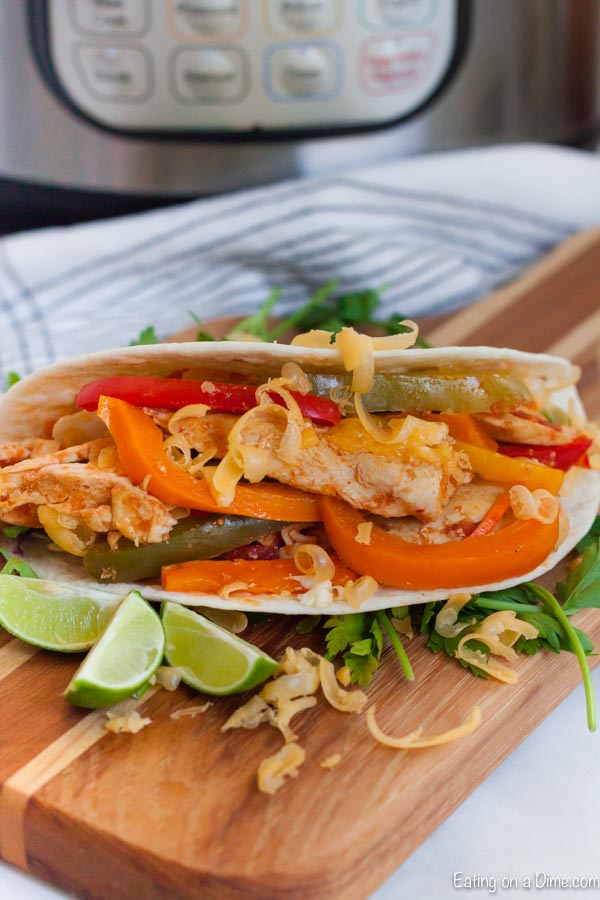 Enjoy fajitas any day of the week when you make Instant Pot Chicken Fajitas Recipe in minutes. Tender chicken, veggies and more make dinner amazing.