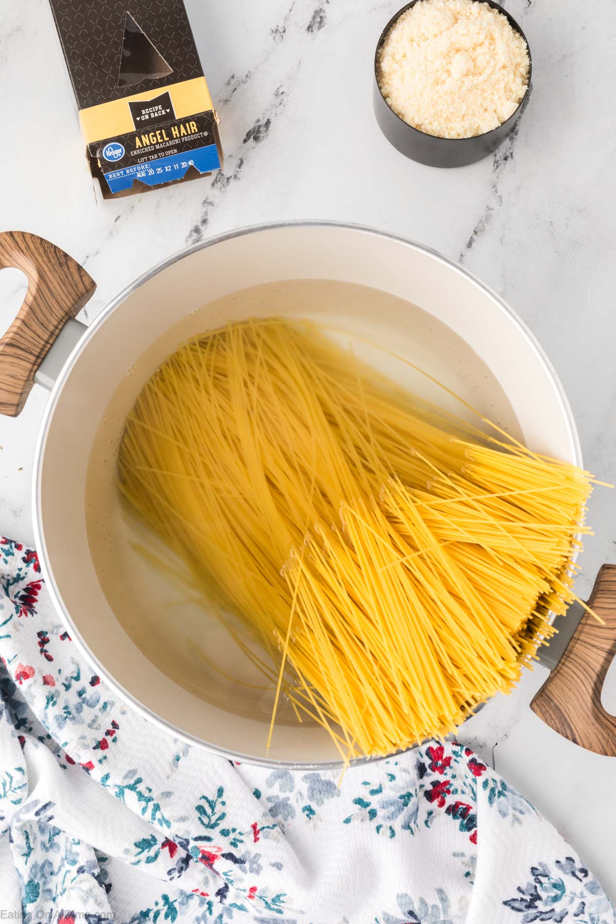 Placing the pasta into the boiling water