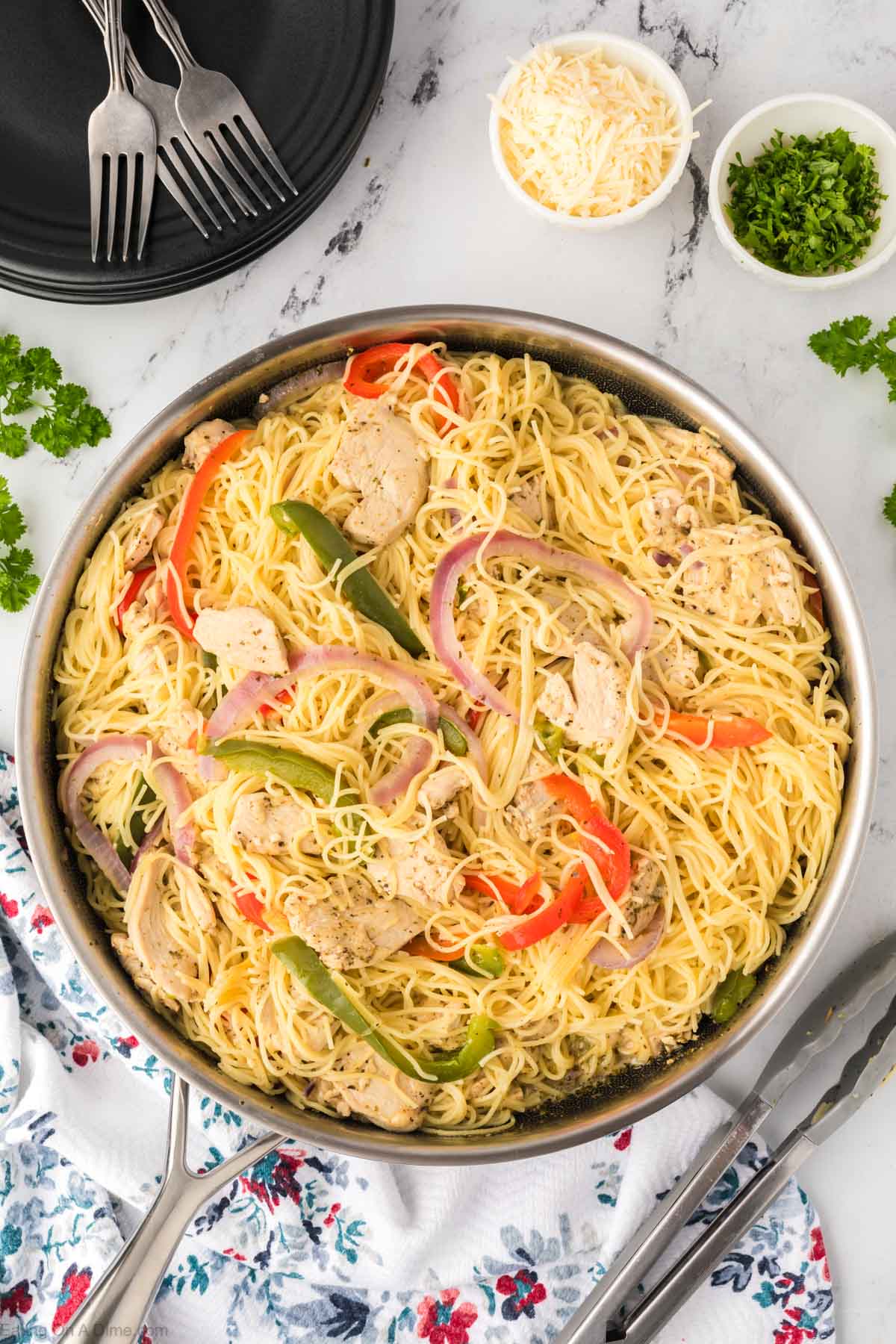 Chicken Scampi Recipe sounds fancy but it is really so simple to prepare. Skip the restaurant and make this delicious meal at home with very little work. Chicken Scampi in a large skillet