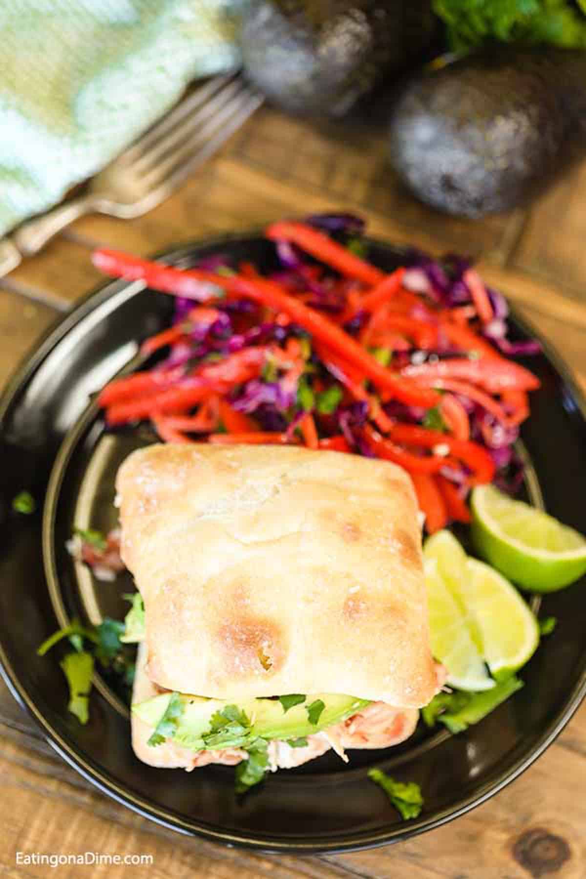 Looking for an easy crock pot dinner? Then you have to make this slow cooker Mexican Chicken Avocado Sandwich. This crock pot recipe will surprise you! 