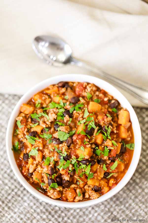 Try Turkey Sweet Potato Chili for a new and delicious twist on the traditional chili recipe.  The flavor is amazing in this healthy turkey chili recipe. 