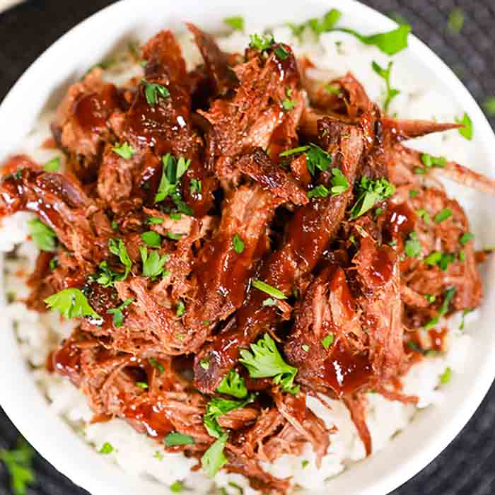Tender beef is slow cooked to perfection in adobo sauce and BBQ sauce for the best Crock pot chipotle bbq beef recipe. It is so easy and delicious. 