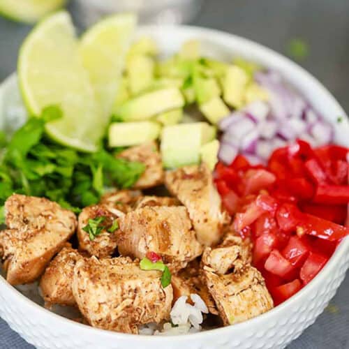 Enjoy your favorite chicken bowl with this Crock Pot Chipotle Chicken Bowl Recipe. Everyone can customize their bowl to their liking for the perfect meal.