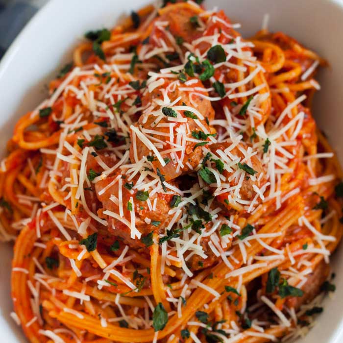 Spaghetti and Meatballs in a white bowl