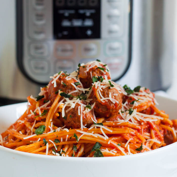 Instant Pot Spaghetti and Meatballs Recipe is a one pot meal thanks to the pressure cooker. Spend less time cooking and cleaning when you try this.