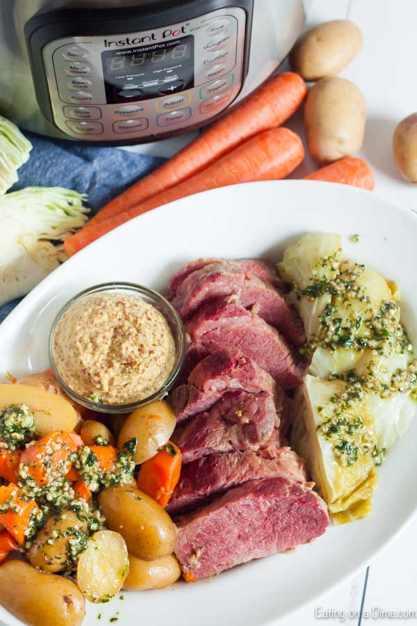 Instant Pot Corned Beef and Cabbage is quick and easy in the pressure cooker. Enjoy this traditional corned beef instant pot recipe with very little work.