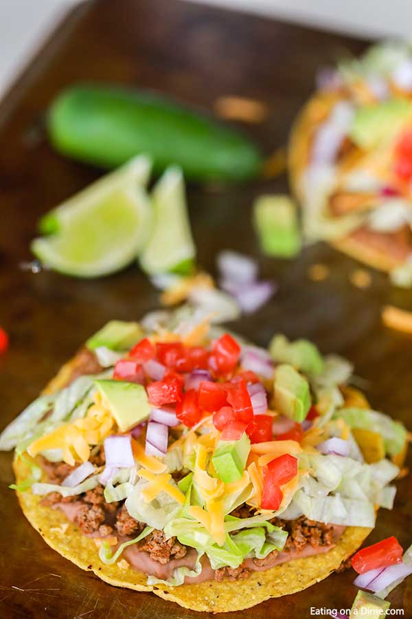 Ground Beef Tostada Recipe is such a fun dinner idea and tasty too. Serve this meal for your family or make tostadas for a crowd. This meal is so easy.