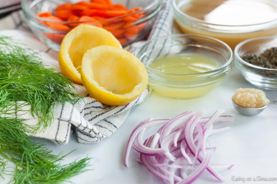 Ingredients Needed - Chicken Thighs, red onions, carrots, oregano, lemon, basil, garlic, thyme, broth, pita bread, tzatziki sauce