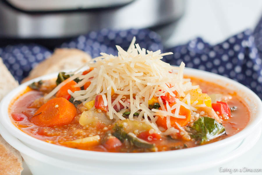 Get dinner on the table in under 5 minutes with this easy Instant Pot Quinoa Soup Recipe. Loaded with hearty vegetables and quinoa, this soup is amazing.