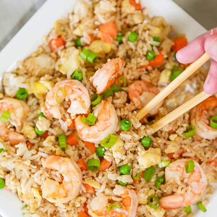 Skip takeout and make this delicious Shrimp Fried Rice Recipe at home in minutes. The shrimp and veggies have the best flavor to make the perfect meal. Skip takeout and make this delicious Shrimp Fried Rice Recipe at home in minutes. The shrimp and veggies have the best flavor to make the perfect meal.