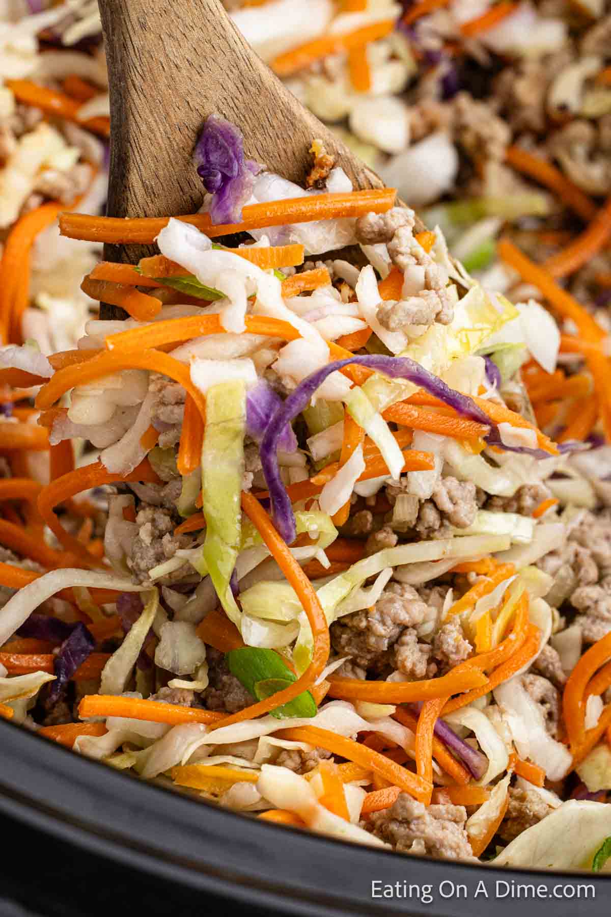 Close up image of egg roll in a bowl in the slow cooker