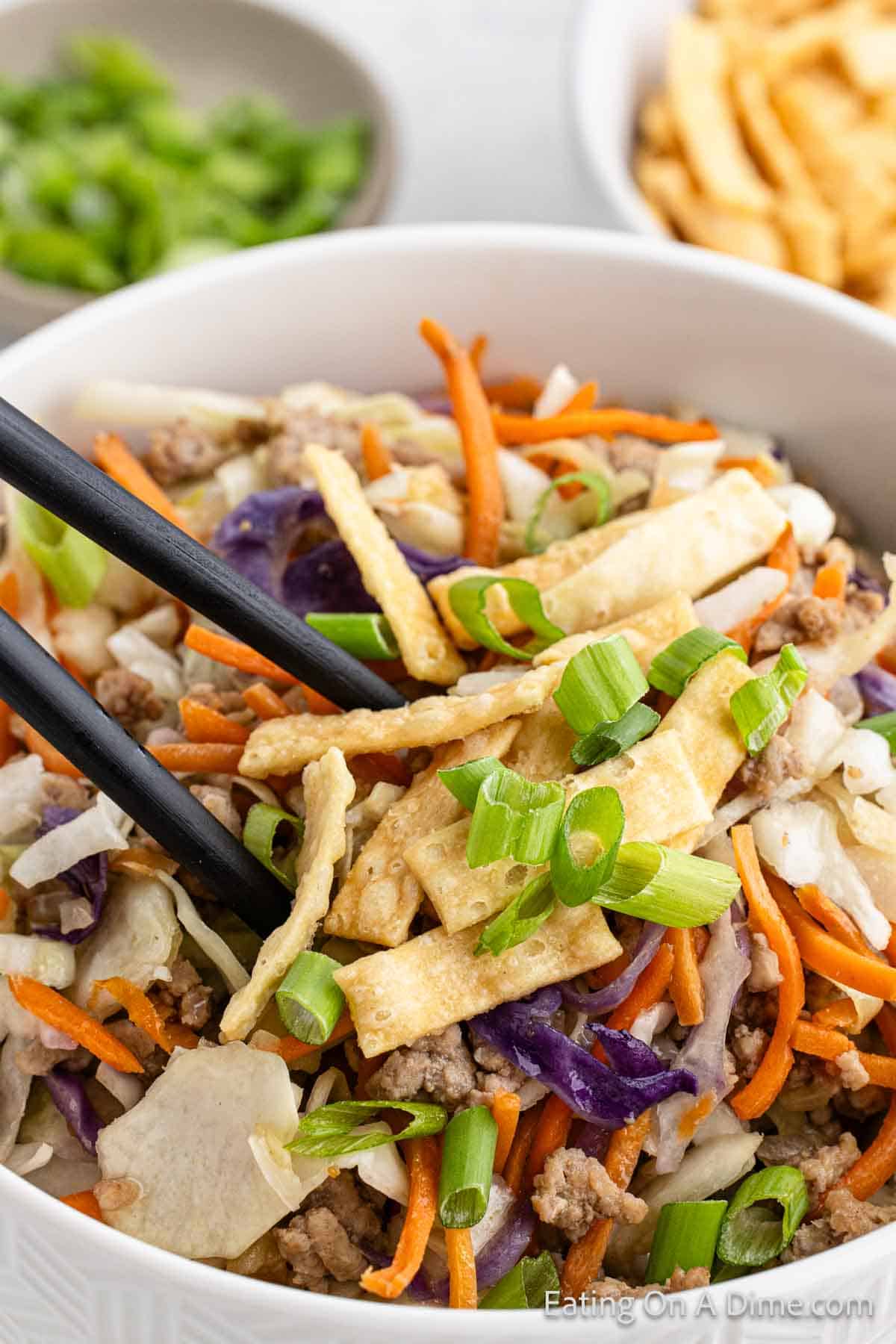 Close up image of egg roll in a bowl in a bowl