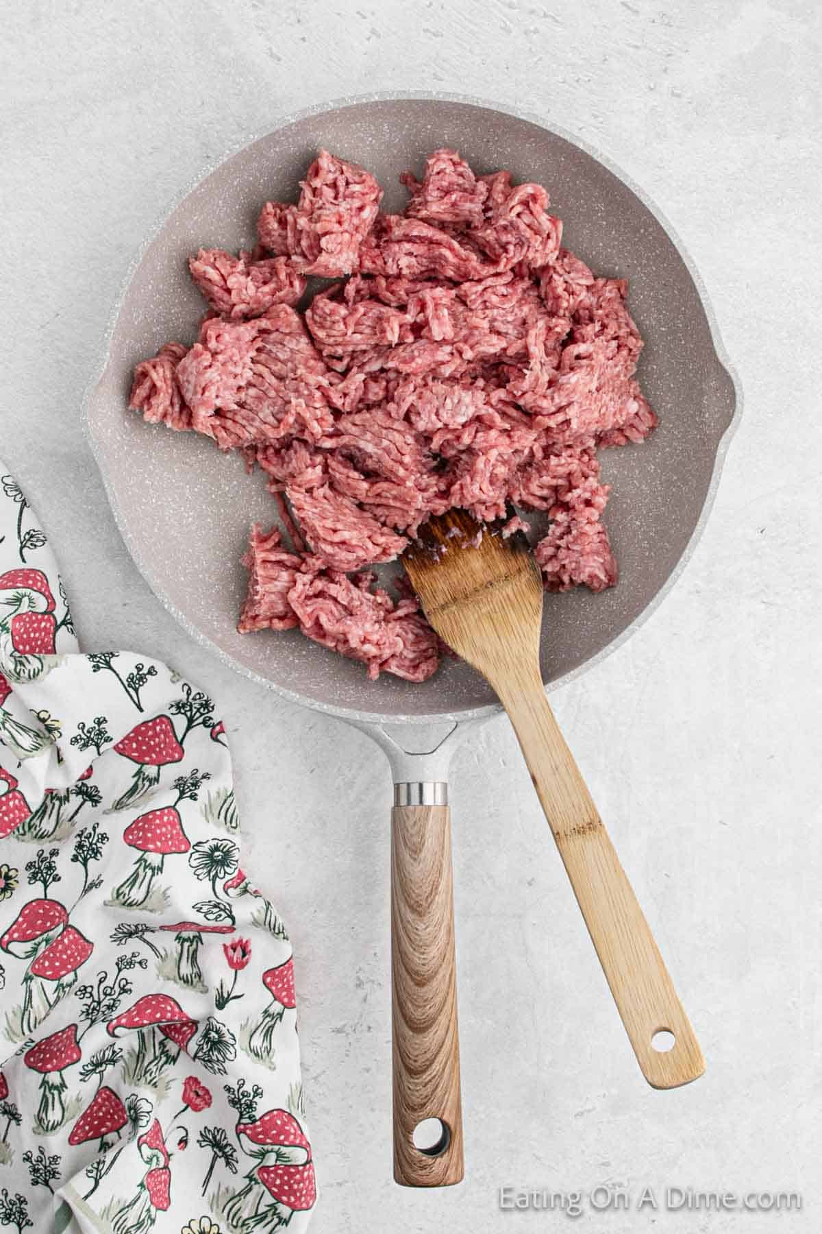 Cooking the ground beef in a skillet