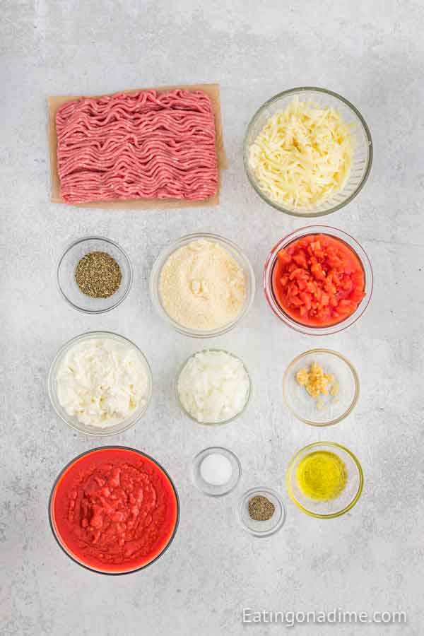 Ingredients needed - ground turkey, olive oil, onion, diced tomatoes, crushed tomatoes, minced garlic, italian seasoning, salt and pepper, lasagna noodles, ricotta cheese, mozzarella cheese, parmesan cheese