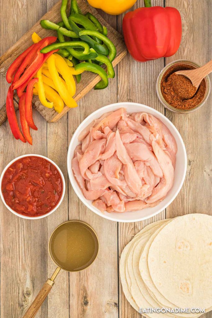 Ingredients needed - chicken, salsa, chicken broth, taco seasoning, bell peppers, flour tortilla
