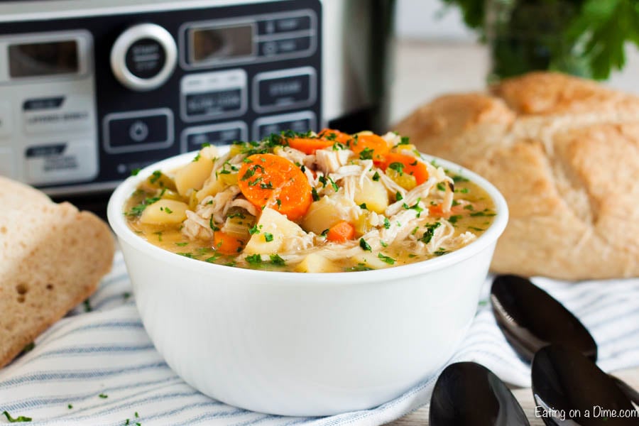 Come home to the best comfort food when you make this easy and healthy Crock pot chicken stew recipe. Each bite of chicken, potatoes and vegetables make this a delicious and simple meal in the slow cooker. Crockpot meals make dinner a breeze. #eatingonadime #crockpotchickenstewrecipe #slowcookereasyrecipes #glutenfree