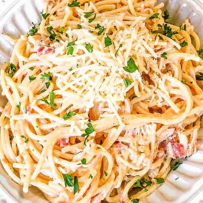 Crock Pot Cheesy Chicken Spaghetti Recipe is a creamy and delicious twist on traditional spaghetti. It is so easy to prepare and a tasty dinner idea. 