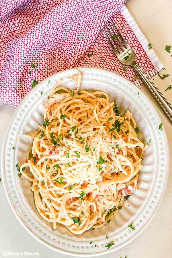 Crock Pot Cheesy Chicken Spaghetti Recipe is a creamy and delicious twist on traditional spaghetti. It is so easy to prepare and a tasty dinner idea. 