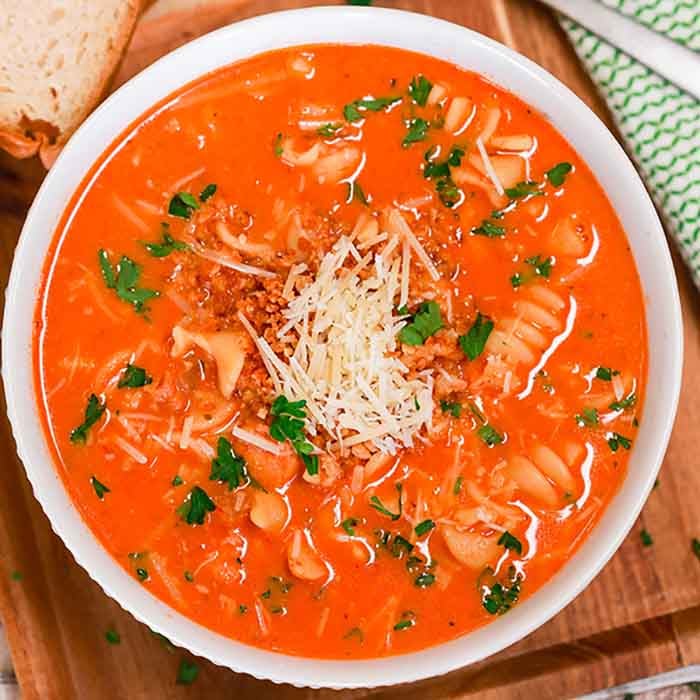 photo of crock pot creamy chicken parmesan soup in a white bowl