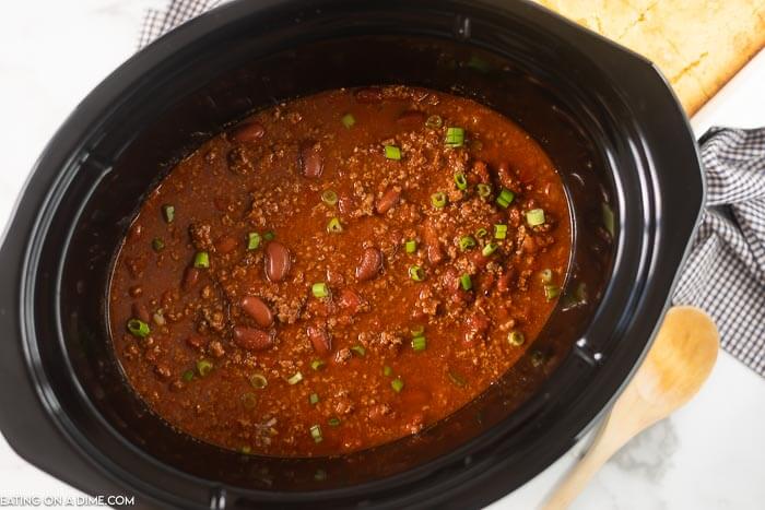 close up image of chili in a crock pot. 