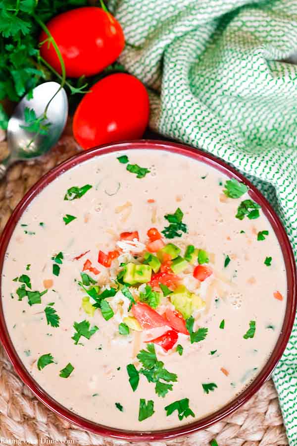 Crock pot cream cheese chicken chili recipe has everything you love about classic chili but with a delicious cream broth. This chili is easy and delicious.
