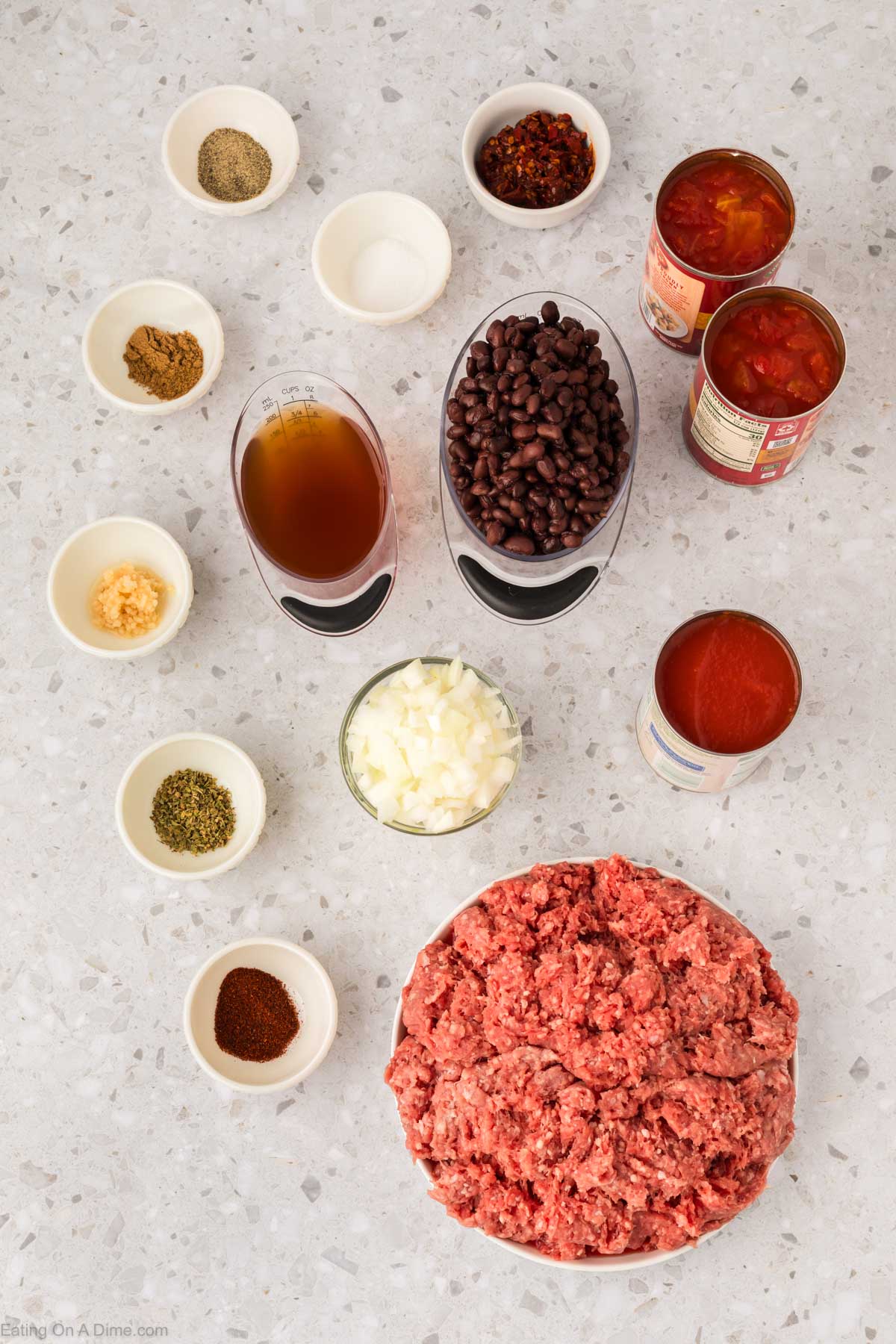 Ingredients for Chipotle Chili - Ground Beef, Onion, Garlic, diced tomatoes, tomato sauce, black beans, chipotle chiles peppers, beef broth, chili powder, oregano, cumin, salt and pepper
