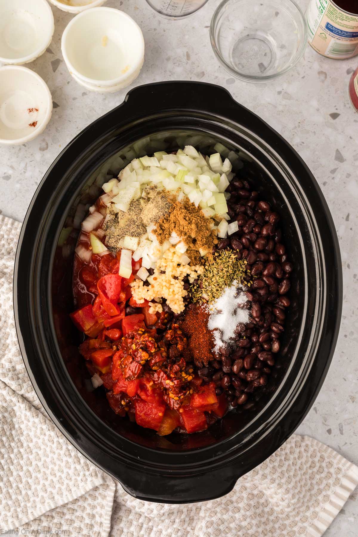 Placing the rest of the ingredients in the slow cooker