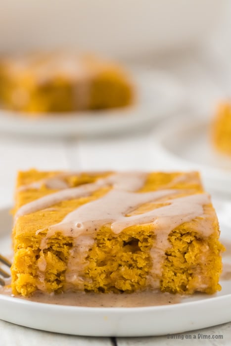 cake square on plate with glaze