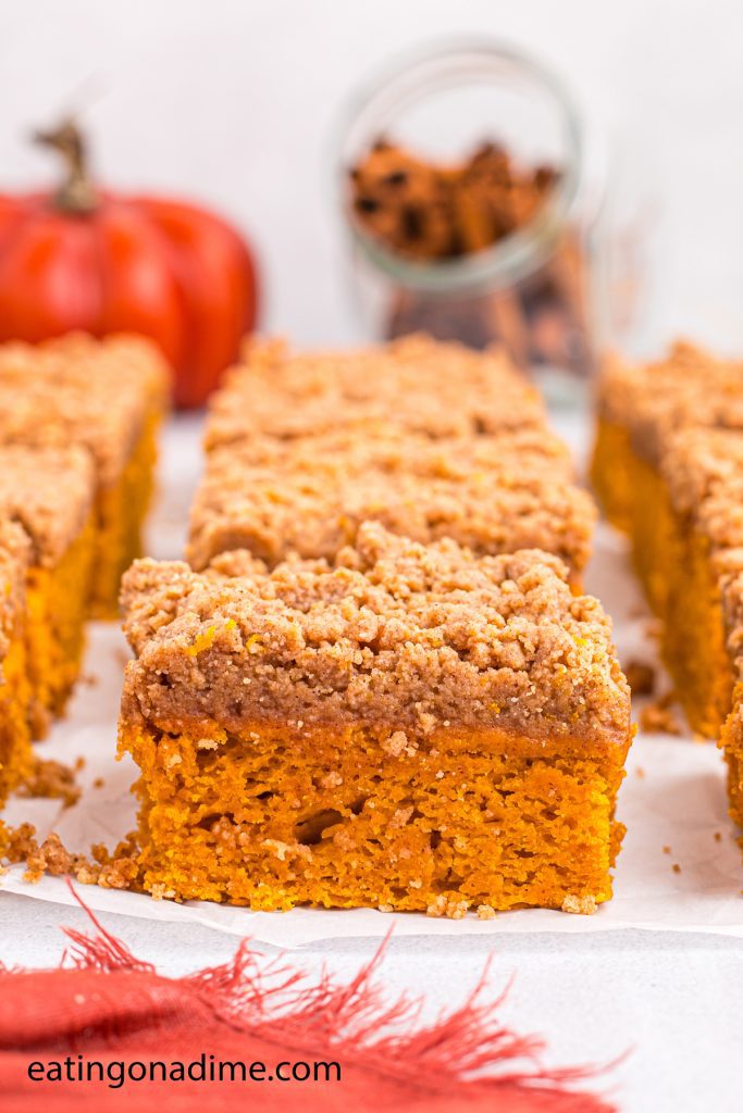 Pumpkin Coffee Cake cut into slices on a platter