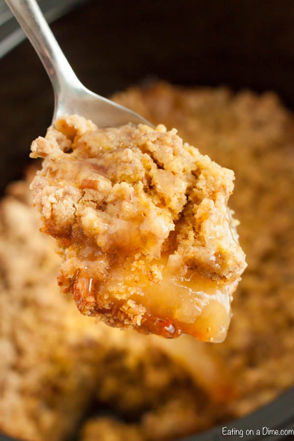 Apple Dump Cake with a serving on a spoon