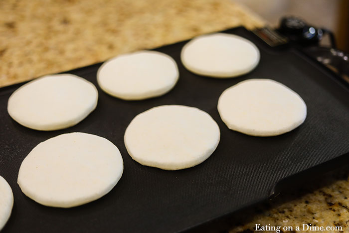 Learn how to make arepas with just a few simple ingredients. This arepas recipe is gluten free and you can literally eat them with anything you like! 