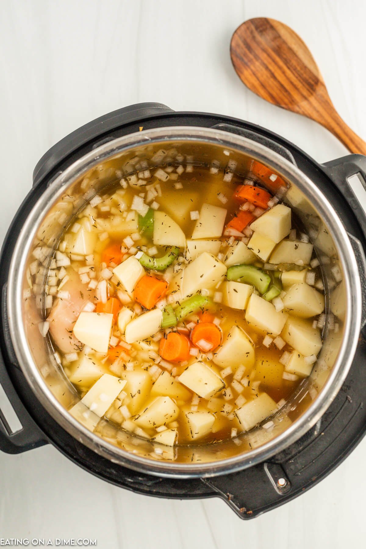 Placing all the ingredients in the pressure cooker