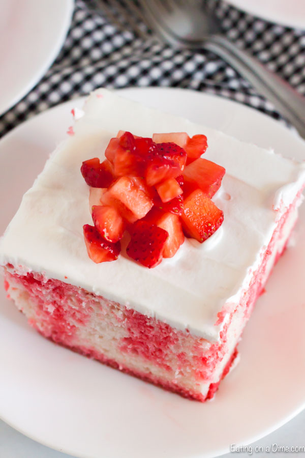 Close up image of Strawberry Jello Cake mix on a white plate. 