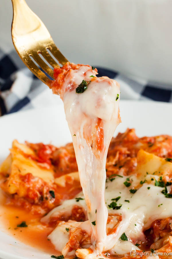 Lazy day chicken lasagna recipe gives you all the things you love about traditional lasagna without the work. Make this in minutes with little effort. 