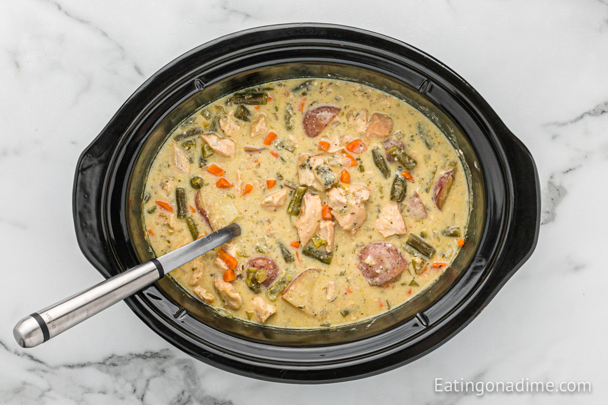 Close up image of Creamy Chicken Stew in a slow cooker