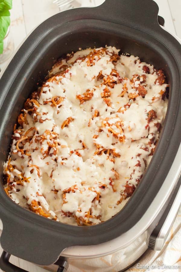 Spaghetti in the slow cooker topped with cheese