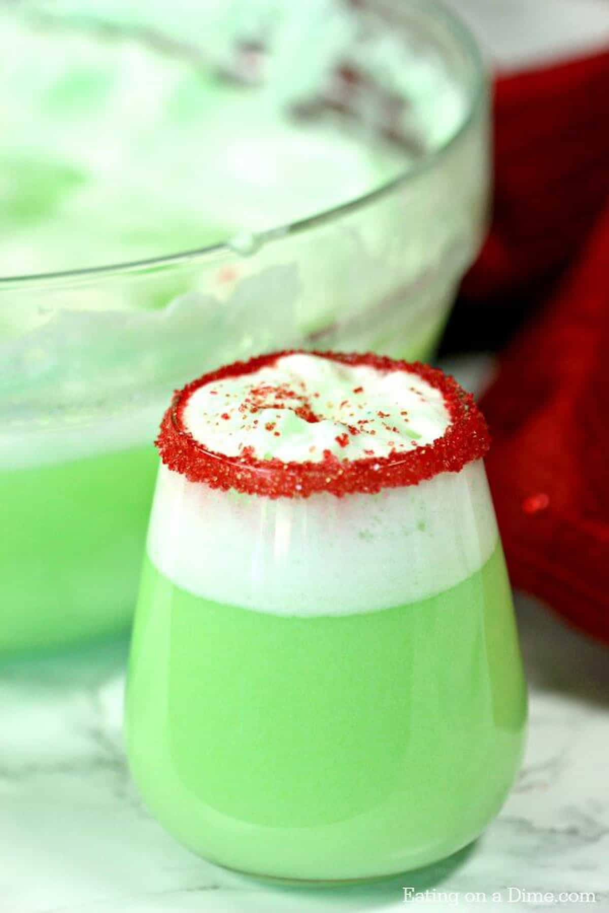 Close up image of decorative glass of Grinch Punch. 