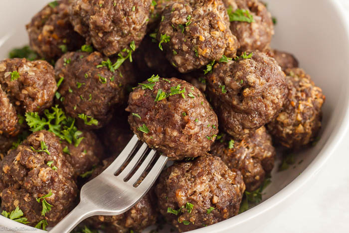 This easy meatball recipe is so delicious while being a breeze to make. The flavor can't be beat and you will love this easy Italian meatball recipe. 