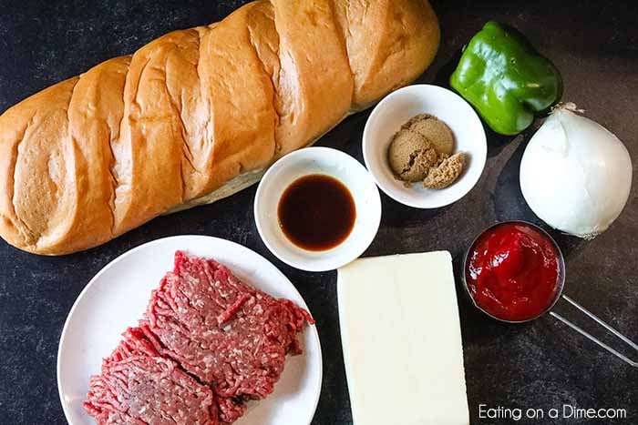 Sloppy joes stuffed french bread recipe has everything you love about sloppy joes in a cheese stuffed bread. This is the perfect party food or dinner idea.