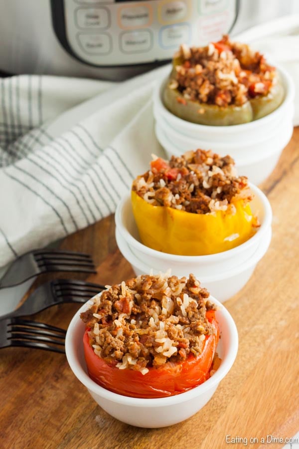 Get dinner on the table fast with this Instant pot stuffed peppers recipe. In just 7 minutes, your family can enjoy delicious instant pot stuffed peppers.