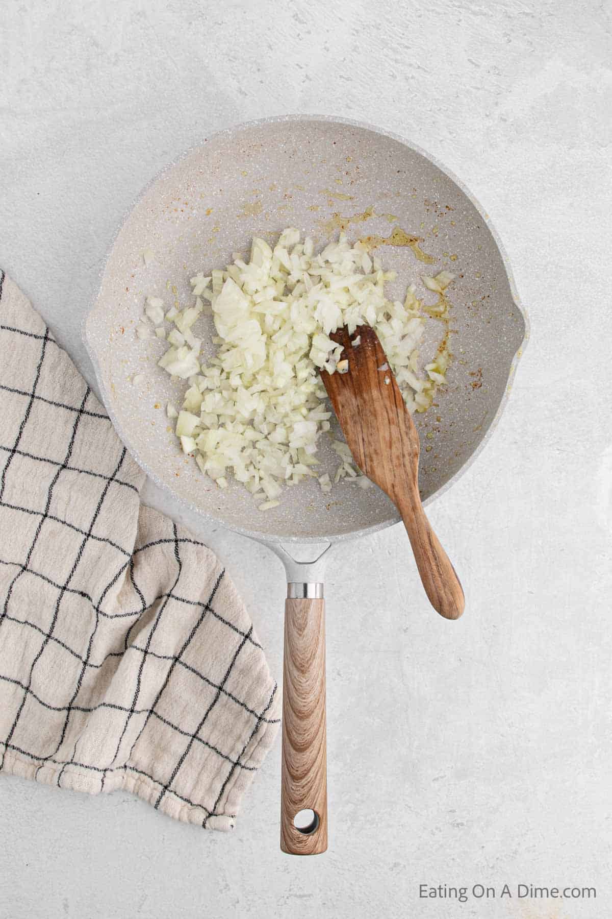 Cooking the onions into the skillet