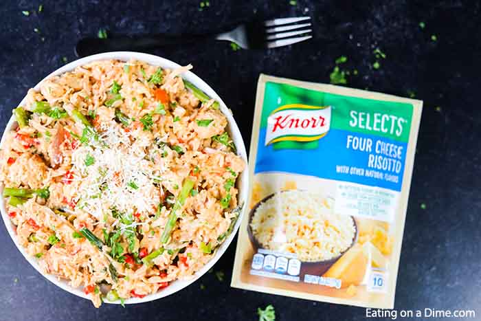 You'll love this quick & easy chicken risotto recipe. This simple chicken parmesan risotto recipe is ready in under 30 minutes and everyone loves it. Also, this creamy chicken risotto recipe is healthy too. One of my favorite one pot meals! #eatingonadime #risotto #dinnerrecipes #knorrselects