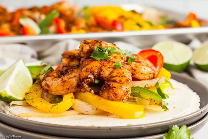 Sheet Pan Shrimp Fajitas Recipe makes dinner time so easy because everything you need is in one pan. Enjoy flavorful shrimp, veggies and the best seasoning. 