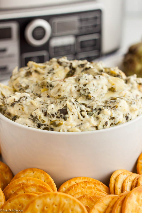 Crockpot Spinach Artichoke Dip is creamy and delicious for the perfect dip for parties, Game Day and more. The crockpot makes it easy to enjoy anytime.